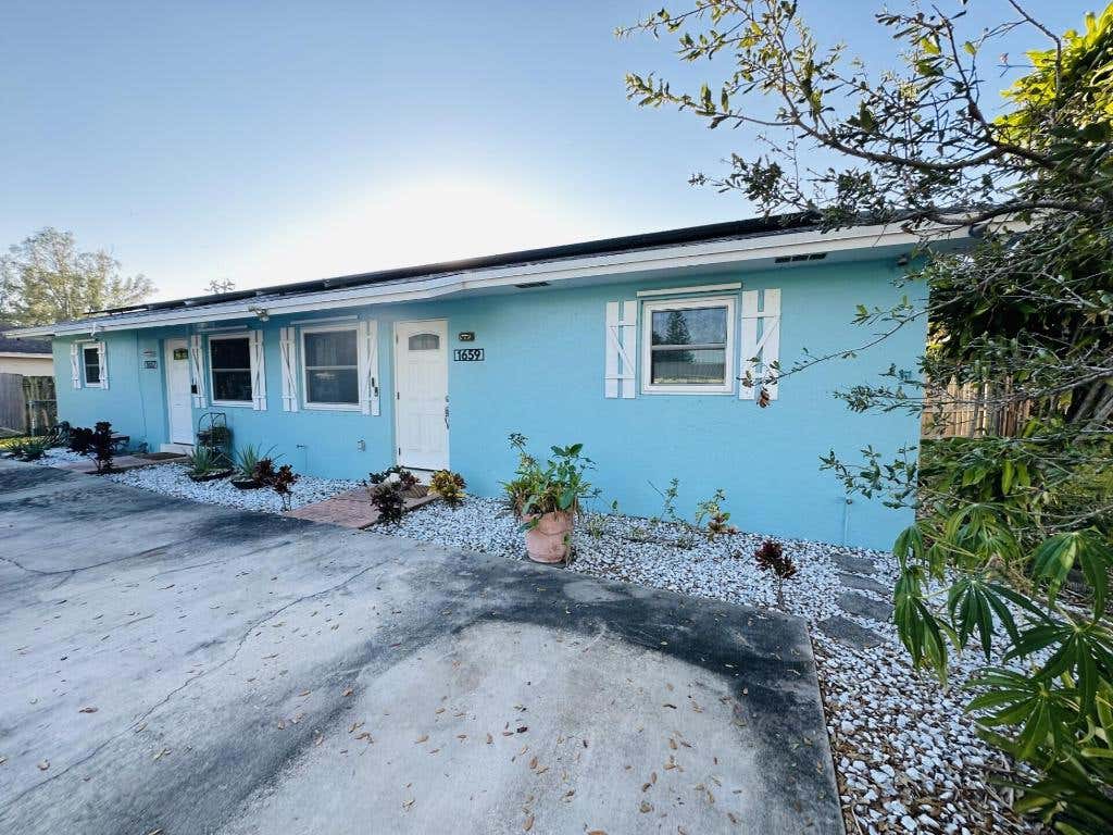 Photo of 1659 Magnolia Dr Lane, West Palm Beach, FL 33417 (MLS # R11149989)