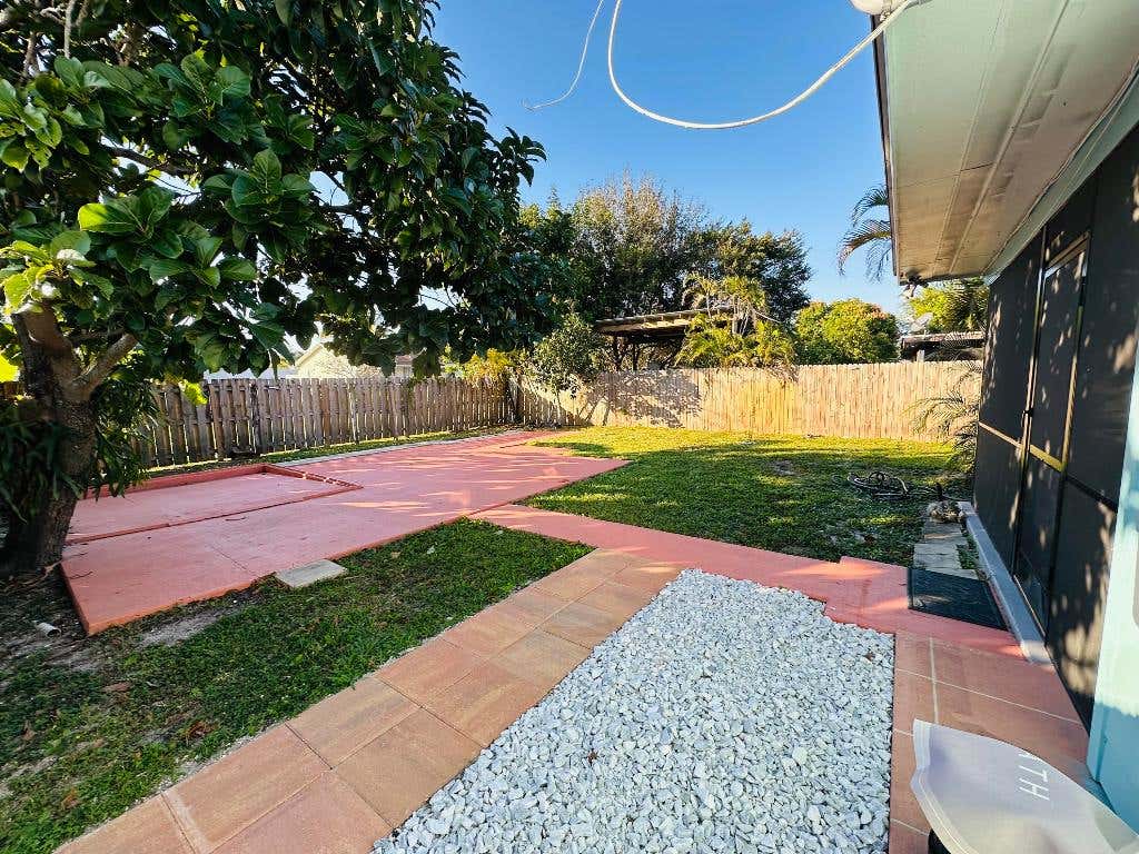 Photo of 1659 Magnolia Dr Lane, West Palm Beach, FL 33417 (MLS # R11149989)