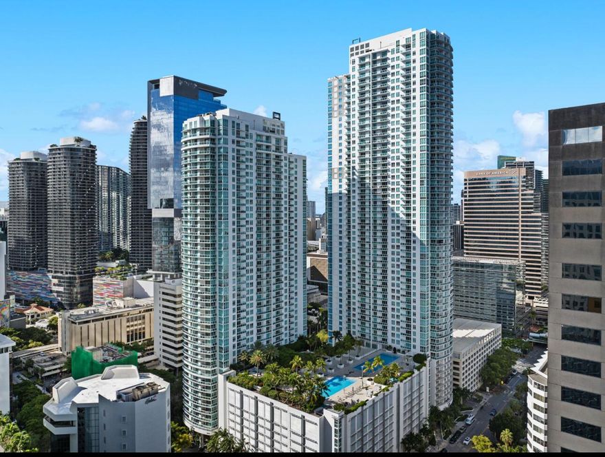 Stunning residence at The Plaza, offering 1 bedroom and 1 bathroom with breathtaking skyline views right in the heart of Brickell. This unit showcases modern finishes including stainless steel appliances, granite countertops, a spacious walk-in closet, and floor-to-ceiling impact windows. Parking is conveniently located on the same level, just a short walk from the unit. Residents can enjoy world-class amenities such as a fully equipped fitness center and spa, versatile club room with billiards, 24-hour valet and front desk service, secured gated entry, two heated swimming pools, and steam/sauna facilities.