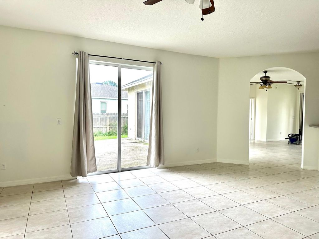 Photo of 1261 SW Santiago Avenue, Port Saint Lucie, FL 34953 (MLS # R11005560)