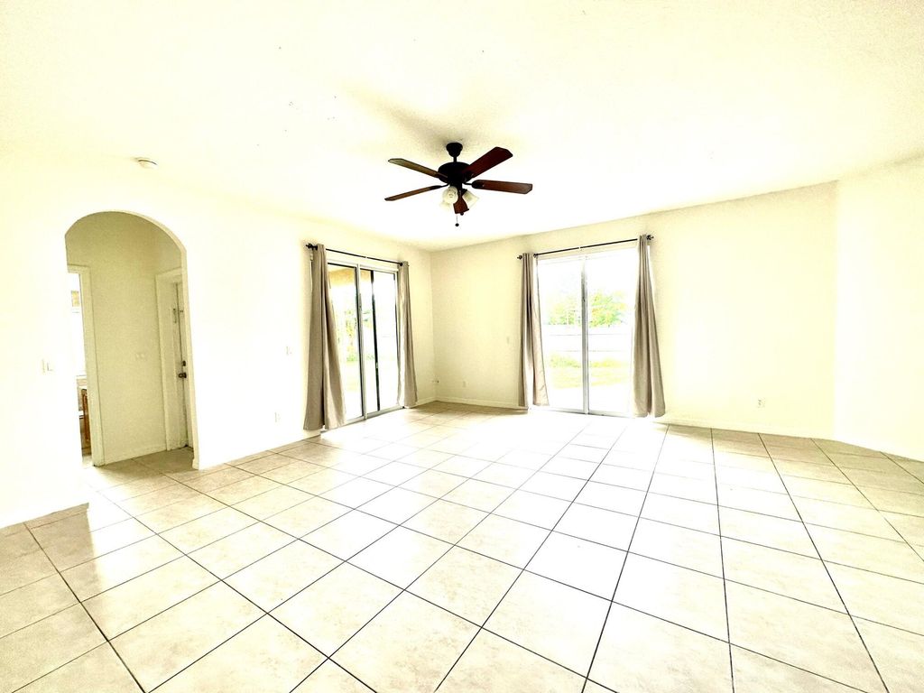 Photo of 1261 SW Santiago Avenue, Port Saint Lucie, FL 34953 (MLS # R11005560)
