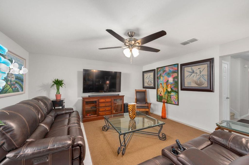 Photo of 5900 NW Pine Trail Circle, Port Saint Lucie, FL 34983 (MLS # R11140983)