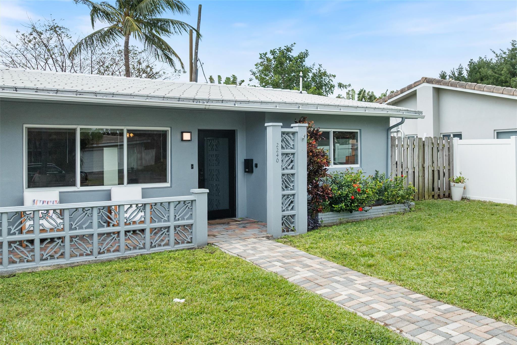 Exclusive opportunity to purchase half a duplex in desired Lighthouse Point. Active AirBnB license is in place with a great track record. Can be purchased fully furnished. Move-in ready 2 BDs + a den / 2 Baths & a fenced back yard. Updated kitchen & bathrooms. Other features include impact windows & doors, tile flooring throughout, a separate laundry room. The den is fully enclosed and is currently used as a 3rd bedroom. Ideally located within walking distance to restaurants & shopping. No HOA. Great investment opportunity! Can be purchased with the other side of the duplex (2242 NE 37th St). Schedule your showing today before this gem is gone!