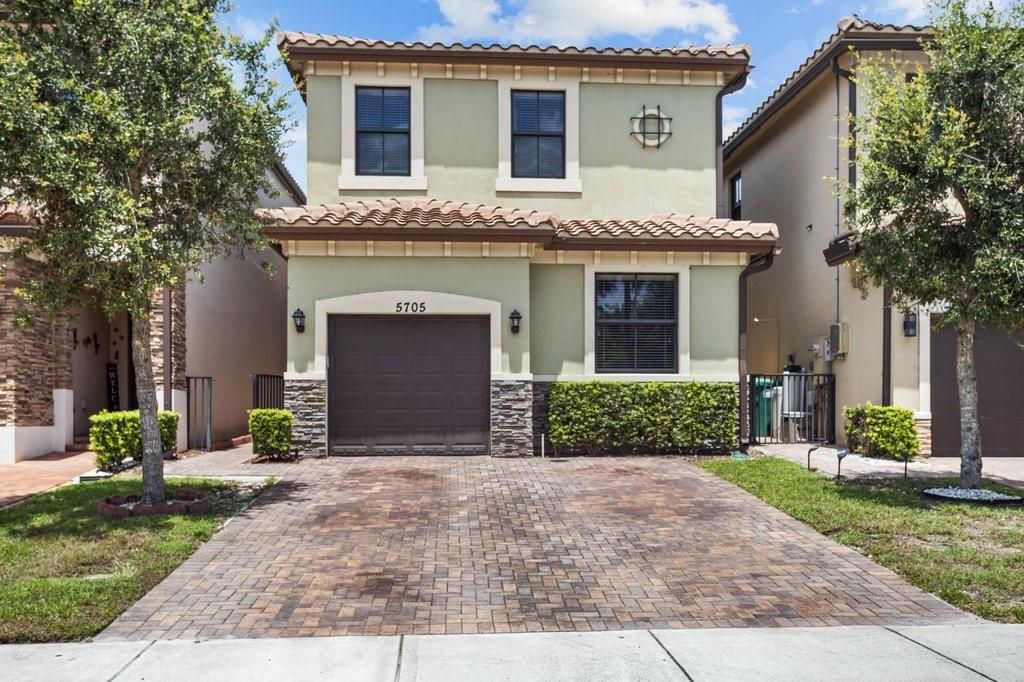 Photo of 5705 NW 47th Ave, Tamarac, FL 33319 (MLS # F10515580)