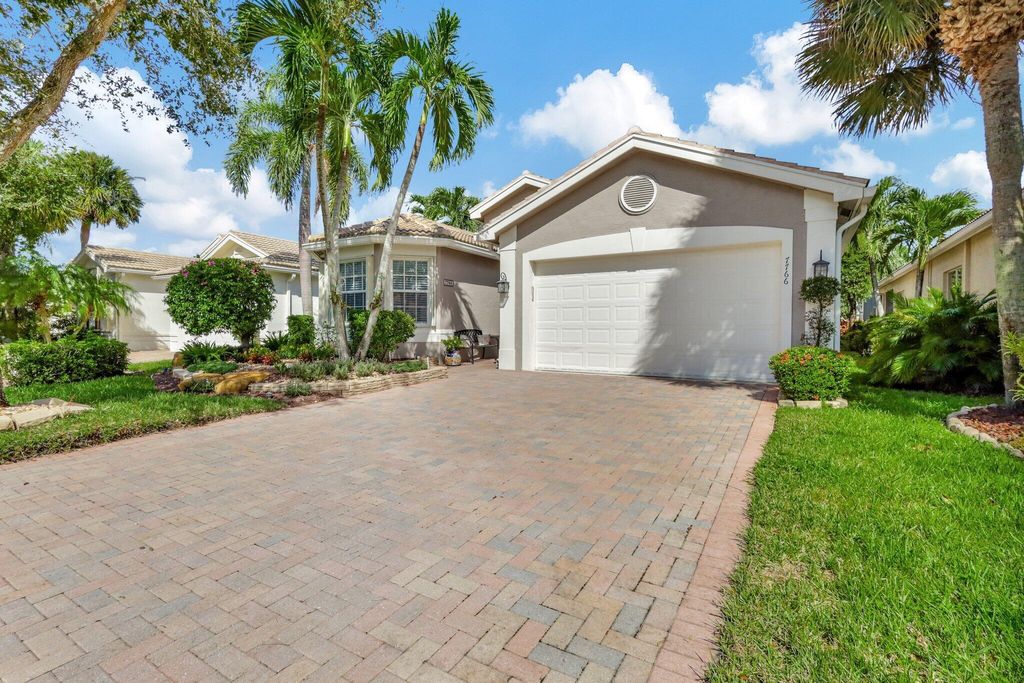 Photo of 7766 Ocean Sunset Drive, Lake Worth, FL 33467 (MLS # R11142763)