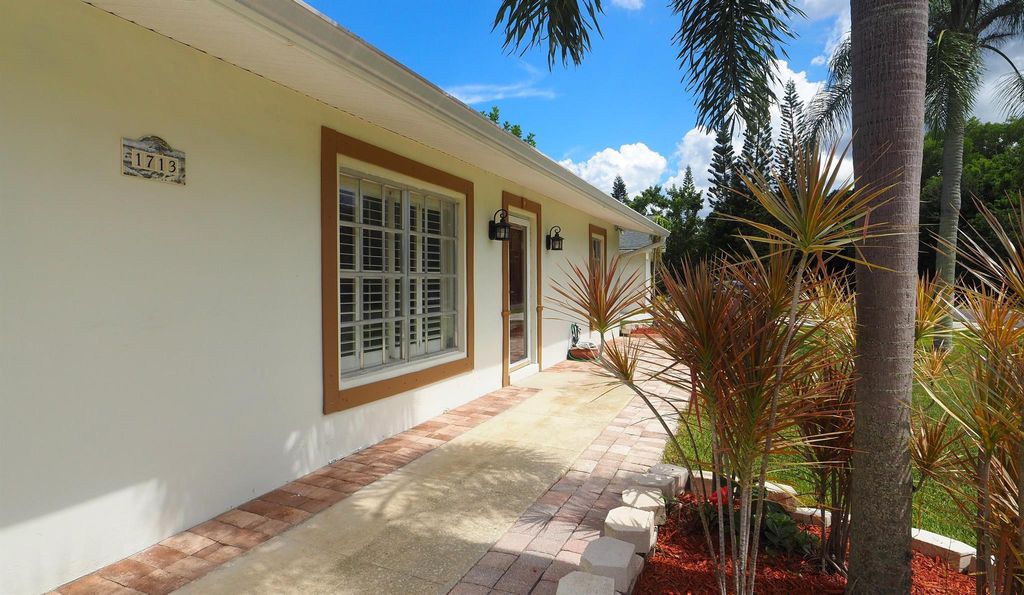 Photo of 1713 SE Clearmont Street, Port Saint Lucie, FL 34983 (MLS # R11112693)