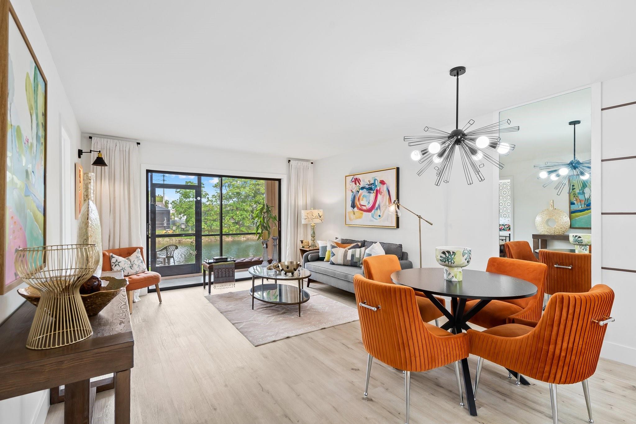 NEW BATHS, TILE & WATERPROOF FLOORING, UPDATED KITCHEN, NEW WATER HEATER & FRESH PAINT THROUGHOUT! Turnkey luxury awaits in this FULLY RENOVATED first-floor 2 beds/1.5 baths & a screened porch overlooking serene waterfront views. Bright open living area w/ elegant finishes, designer lighting & stainless steel appliances. The stunning Jack & Jill & guest baths with custom porcelain tile, modern fixtures & stylish vanities. Hand-painted accent walls in both bedrooms; the primary suite boasts a walk-in closet, extra storage & a dedicated holiday décor room. Residents enjoy resort-style living w/ golf course, tennis & racquetball courts, a fitness center, billiards, heated pool & private clubhouse theater. In a vibrant 55+ community (1 resident 55+, others 16+). FULLY FURNISHED OR UNFURNISHED!