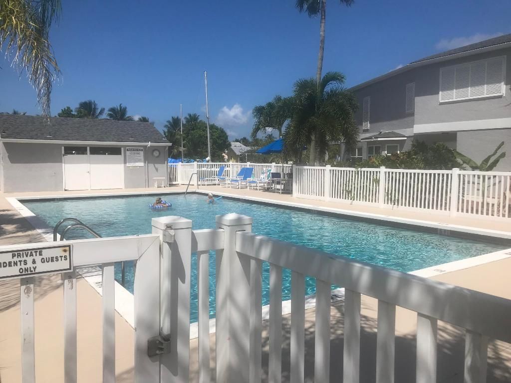 Photo of 2476 Harbour Cove Drive, Hutchinson Island, FL 34949 (MLS # R10905109)