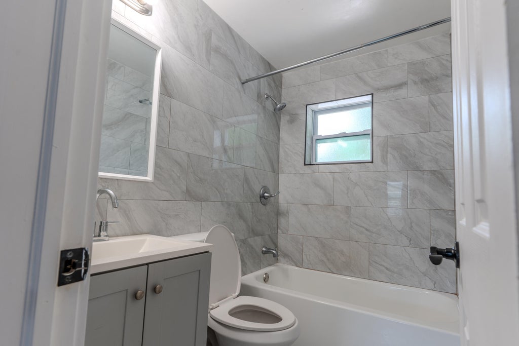 Photo of 711 N 23rd Street #B, Fort Pierce, FL 34950 (MLS # B26046492)