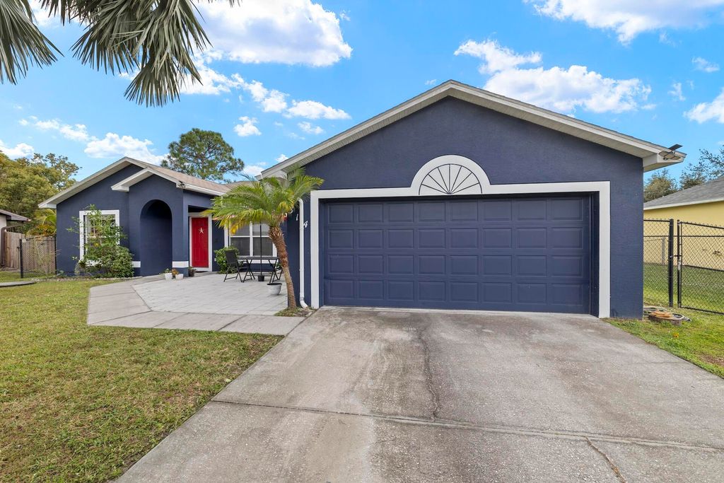 Photo of 314 SW De Gouvea Ter, Port Saint Lucie, FL 34984 (MLS # R11145081)