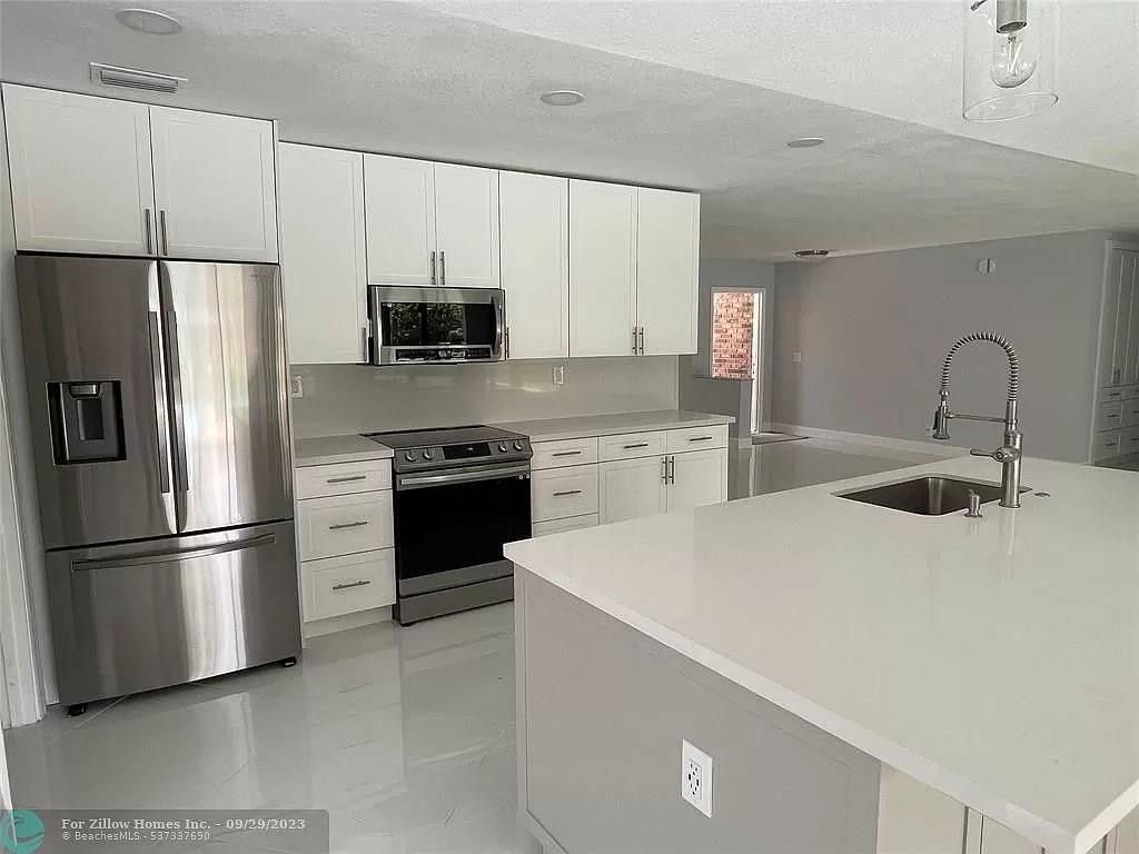 Photo of 9071 NW 13th Street, Plantation, FL 33322 (MLS # F10549201)