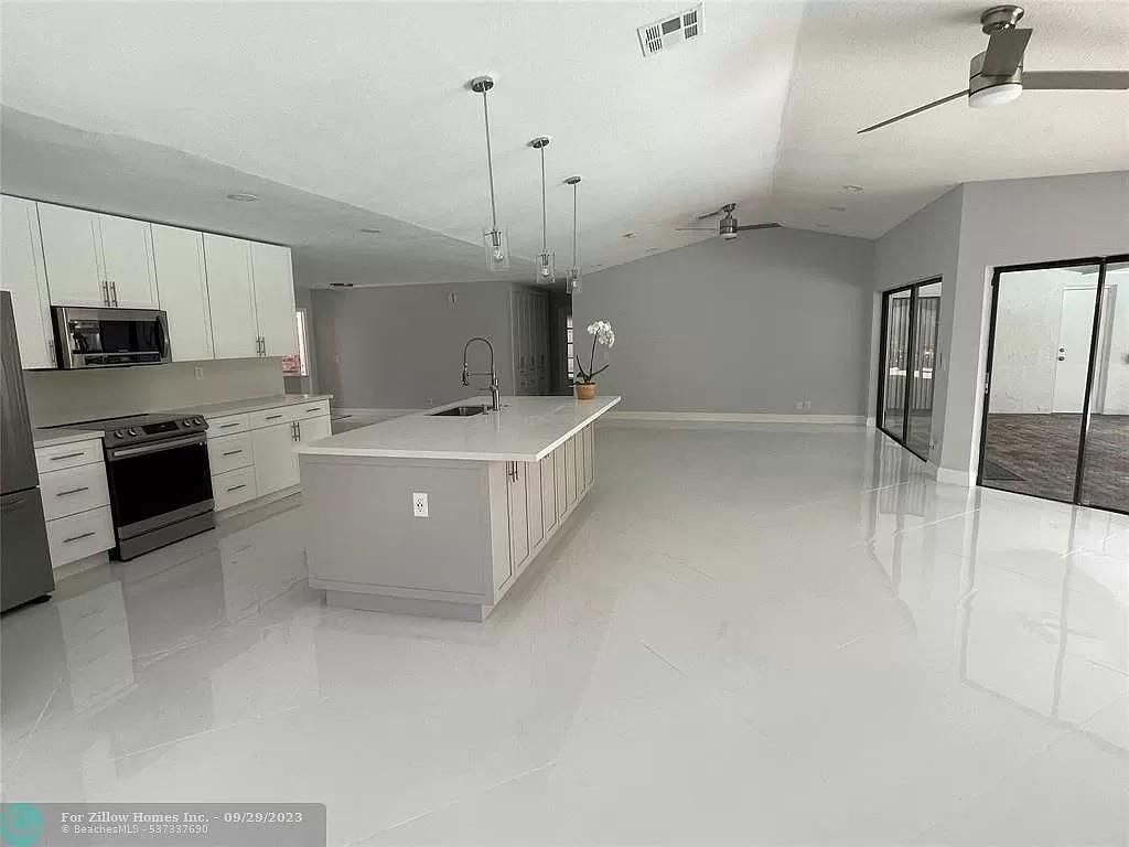 Photo of 9071 NW 13th Street, Plantation, FL 33322 (MLS # F10549201)