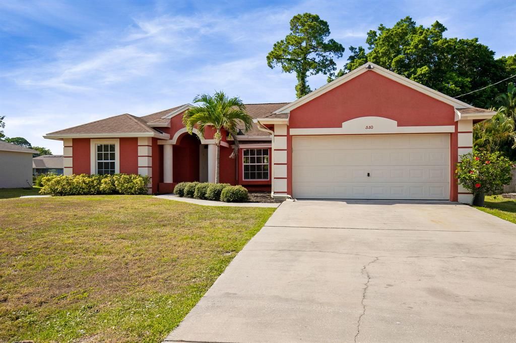 Photo of 330 SE Crosspoint Drive Dr, Port St Lucie, FL 34983 (MLS # R10812726)