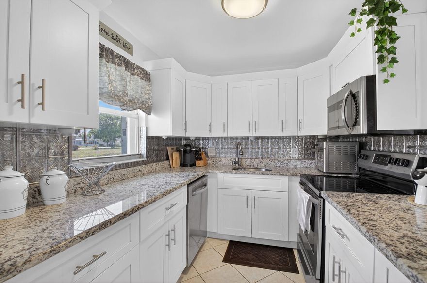 Welcome to easy, waterfront living in this beautifully furnished 2-bedroom, 2-bath corner villa located in the highly desirable Kings Point community. Filled with natural light, this bright and spacious residence offers an open layout designed for both comfort and convenience. Enjoy tile flooring throughout and an updated kitchen that seamlessly blends style and functionality. As a corner unit, you'll appreciate the added privacy, extra windows, and tranquil water views that create a peaceful setting throughout the home. Relax and unwind on the screened terrace. Kings Point is renowned for its vibrant and active 55+ lifestyle, offering an impressive array of amenities including two championship 18-hole golf courses, multiple resort-style pools, tennis and pickleball courts and fitness.  Enjoy a state-of-the-art theater featuring year-round entertainment. Residents also have the convenience of on-site dining, a courtesy shuttle service, and the security of a manned gated entrance. Ideally located near shopping, dining, beaches, and major roadways, this move-in-ready villa offers the perfect opportunity to enjoy the best of South Florida living. Bring your toothbrush & Welcome Home!