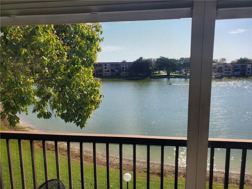 GORGEOUS VIEWS OF THE LAKE FROM YOUR BALCONY, LIVING ROOM, KITCHEN, AND MASTER BEDROOM. CERAMIC TILE THROUGOUT THE ENTIRE CONDO. UPDATED KITCHEN AND BATHROOMS. NEW WASHER AND DRYER. CORAL GATE OFFERS 3 COMMUNITY HEATED POOLS AND SHUFFLEBOARD. TENNIS COURTS AND BASKETBALL ACCROSS CORAL GATE. BEAUTIFUL JOGGING PATH. CLOSE TO ALL MAJOR HWYS, SHOPS, RESTAURANTS, AND MAJOR BANKS. EXCELLENT QUIET COMMUNITY WELL KEPT AND LOTS OF GREEN SORROUNDING CORAL GATE. LOW FEES, AMPLE BEDROOMS AND LIVING AREAS. 5 MIN TO THE COCONUT CREEK CASINO. EXCELLENT LOCATION!!!