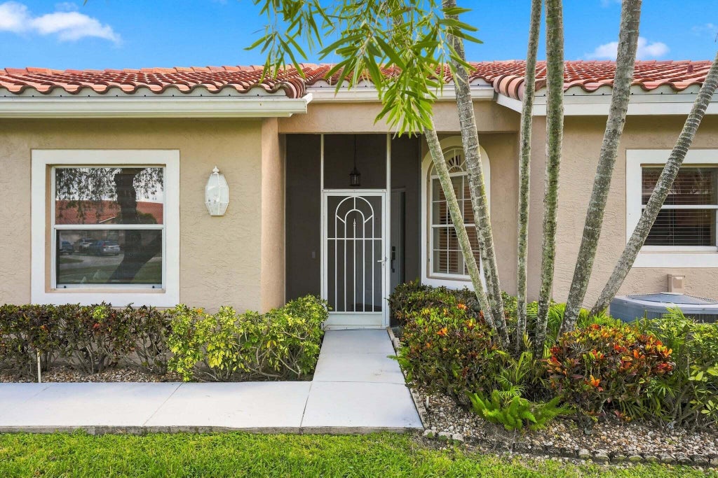Photo of 6276 LONG KEY Lane, Boynton Beach, FL 33472 (MLS # B26092399)