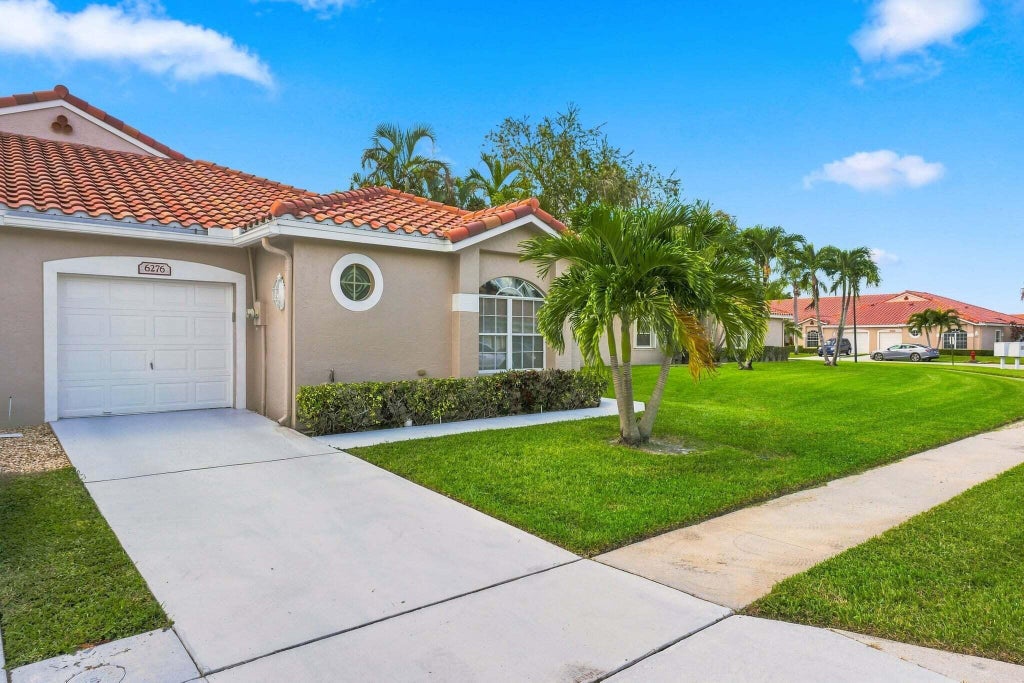 Photo of 6276 LONG KEY Lane, Boynton Beach, FL 33472 (MLS # B26092399)