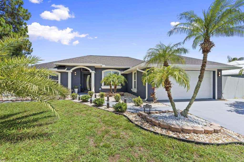 Photo of 510 SW Halifax Avenue, Port Saint Lucie, FL 34953 (MLS # B26048604)