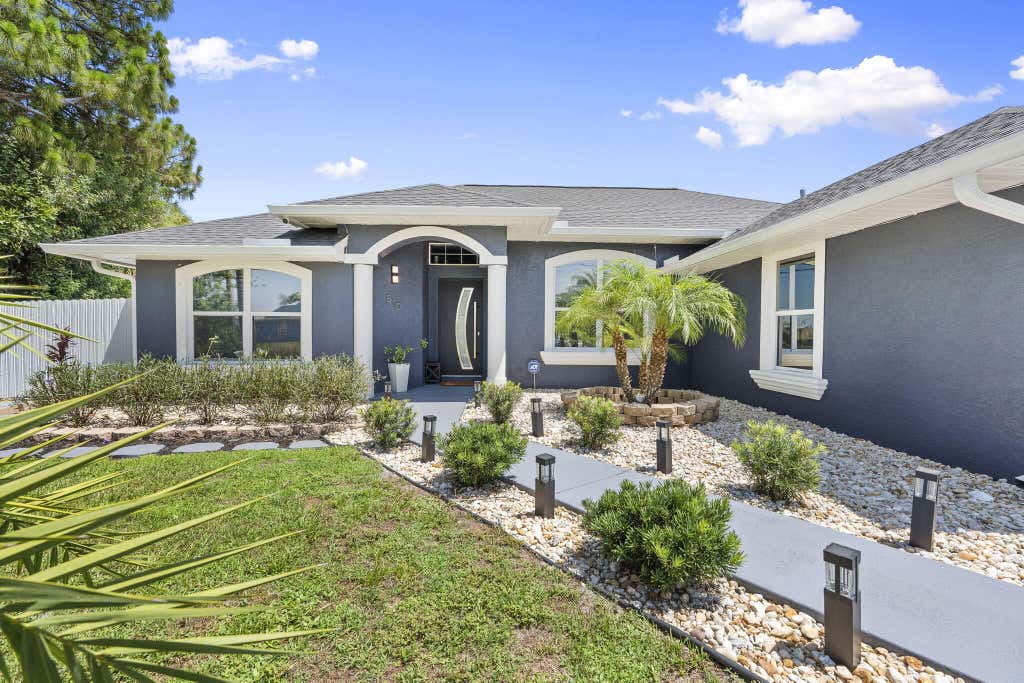 Photo of 510 SW Halifax Avenue, Port Saint Lucie, FL 34953 (MLS # B26048604)