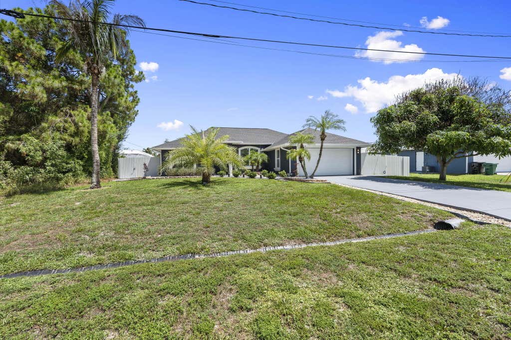 Photo of 510 SW Halifax Avenue, Port Saint Lucie, FL 34953 (MLS # B26048604)