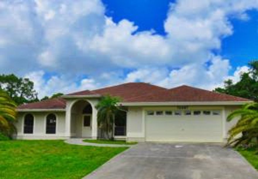 Beautiful spacious single family home sets on a 1.5 acre lot with a pool. Three spacious bedrooms, master bath has double sinks, separate shower, and roman tub. Inviting dining/living area with fireplace, tile flooring, arched doorways, and sliders that leads out to an enclosed patio, which is a great area to entertain family and friends.