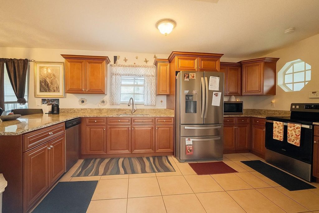Photo of 1403 SW 27th Ct, Fort Lauderdale, FL 33315 (MLS # F10532719)