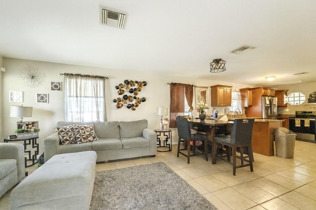 Photo of 1403 SW 27th Ct, Fort Lauderdale, FL 33315 (MLS # F10532719)