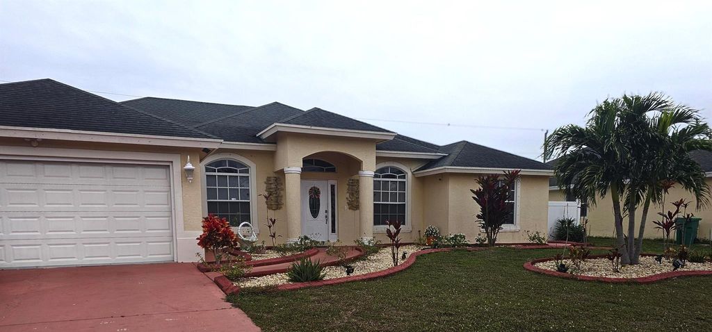 Photo of 562 SW Nadell Avenue, Port Saint Lucie, FL 34953 (MLS # R10949215)