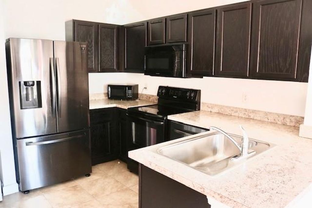 Photo of 3531 NW 29th Ct #n/a, Lauderdale Lakes, FL 33311 (MLS # F10326243)