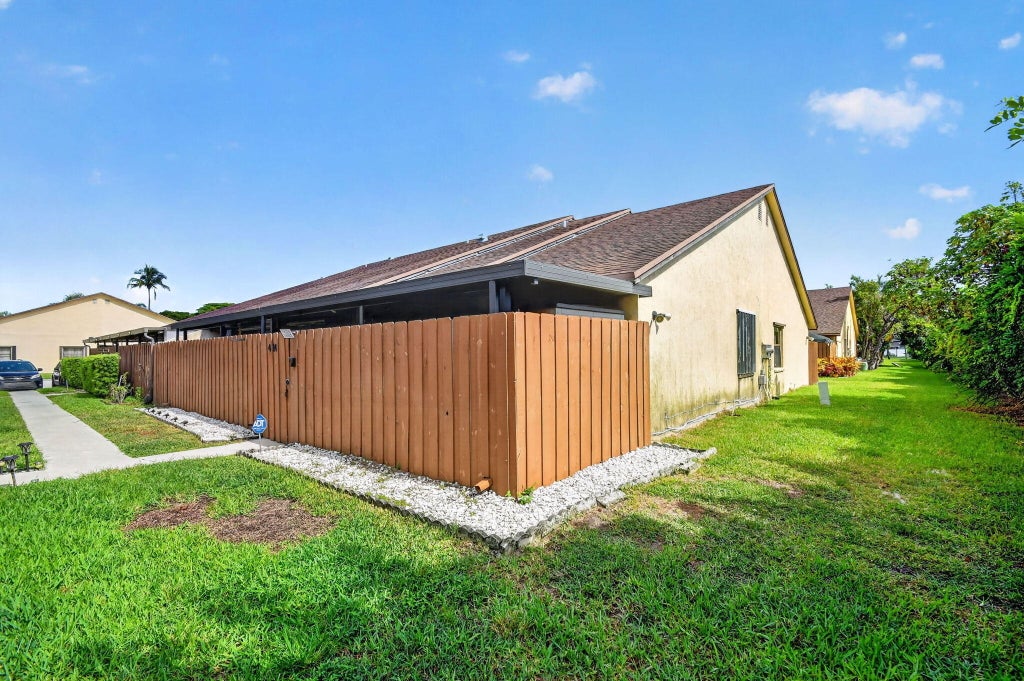 Photo of 414 Springdale Circle, Palm Springs, FL 33461 (MLS # B26044215)
