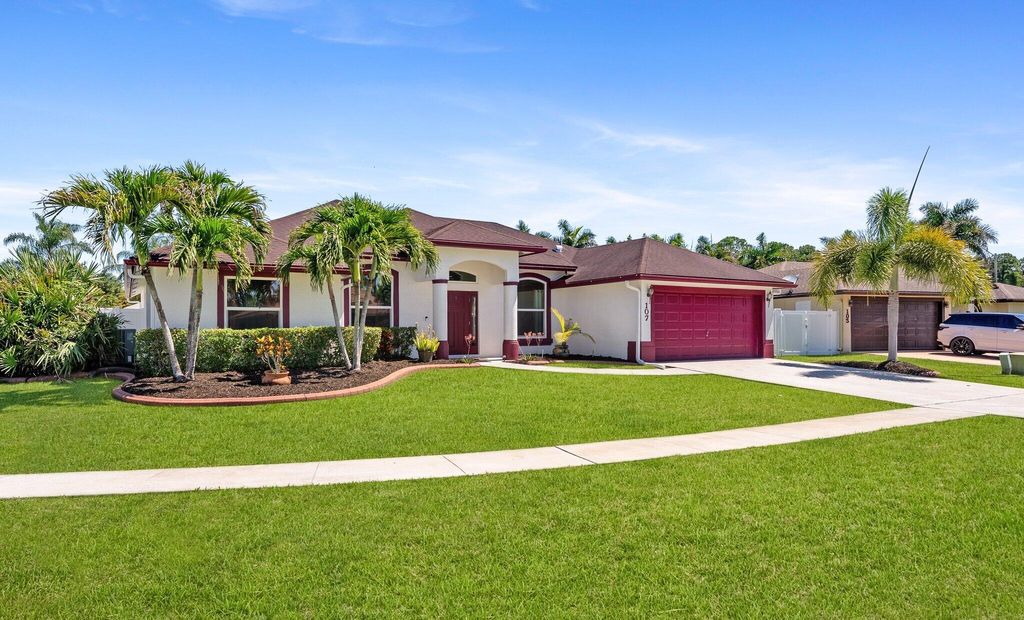 Photo of 107 Sycamore Drive, Royal Palm Beach, FL 33411 (MLS # B26027110)