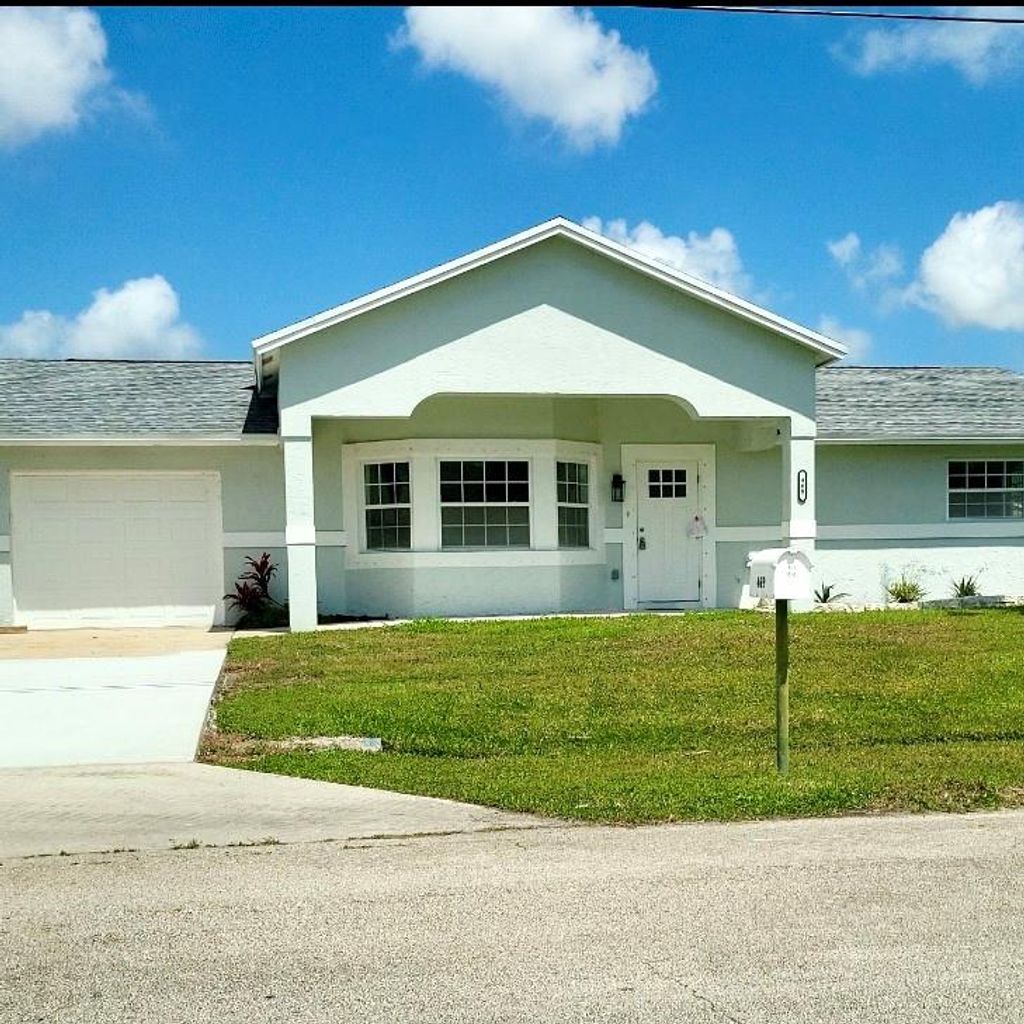 Photo of 469 SW Duval Avenue, Port Saint Lucie, FL 34983 (MLS # F10489794)