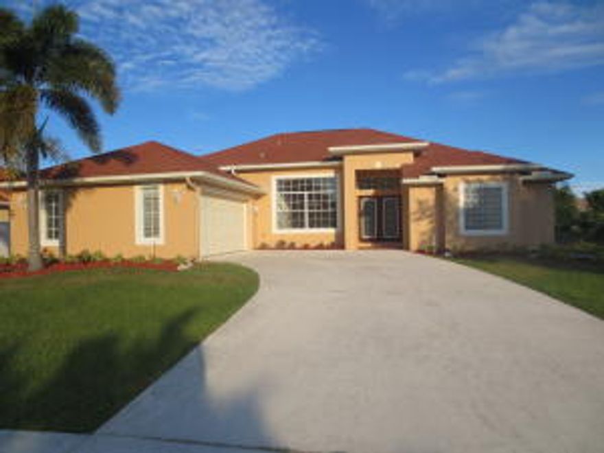 Open concept specious home with 2310 sq ft under air and 3121 sq feet under roof. It has 8 x 34 screened in porch. It has new paint, carpet, appliances and more. Mater bedroom has his and hers walk-in closets. Master bath has double sinks, roman tub and a separate shower. 4th bedroom ideal for an office. Laundry room has build in ironing board. Quiet neighborhood, close to all the shopping at St Lucie west. Priced for quick sale.