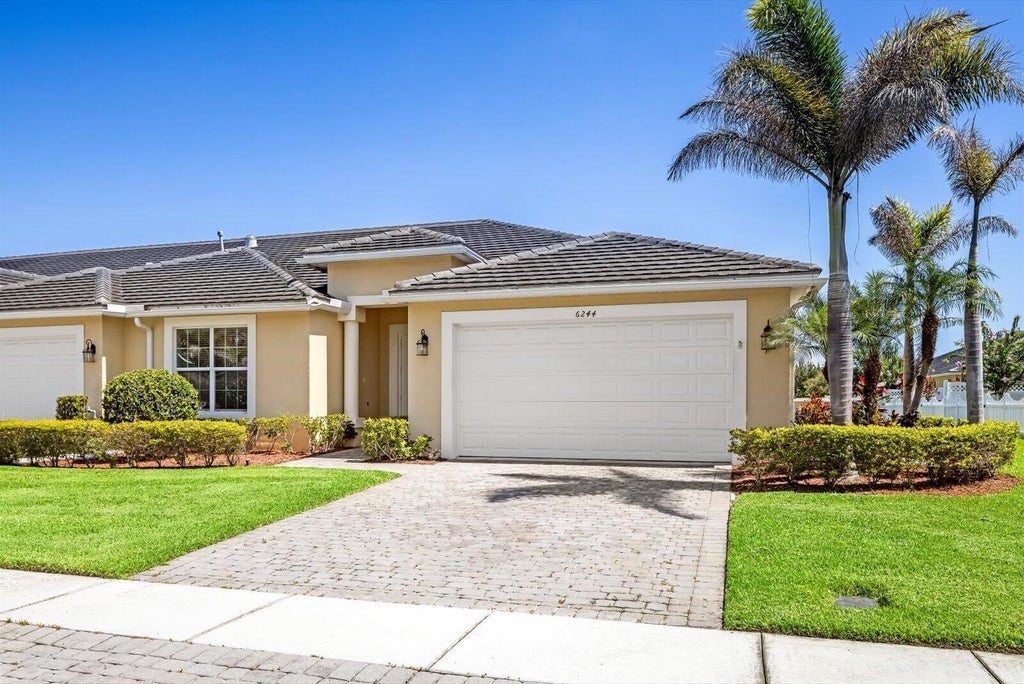 Photo of 6244 NW Helmsdale Way, Port Saint Lucie, FL 34983 (MLS # B26045333)