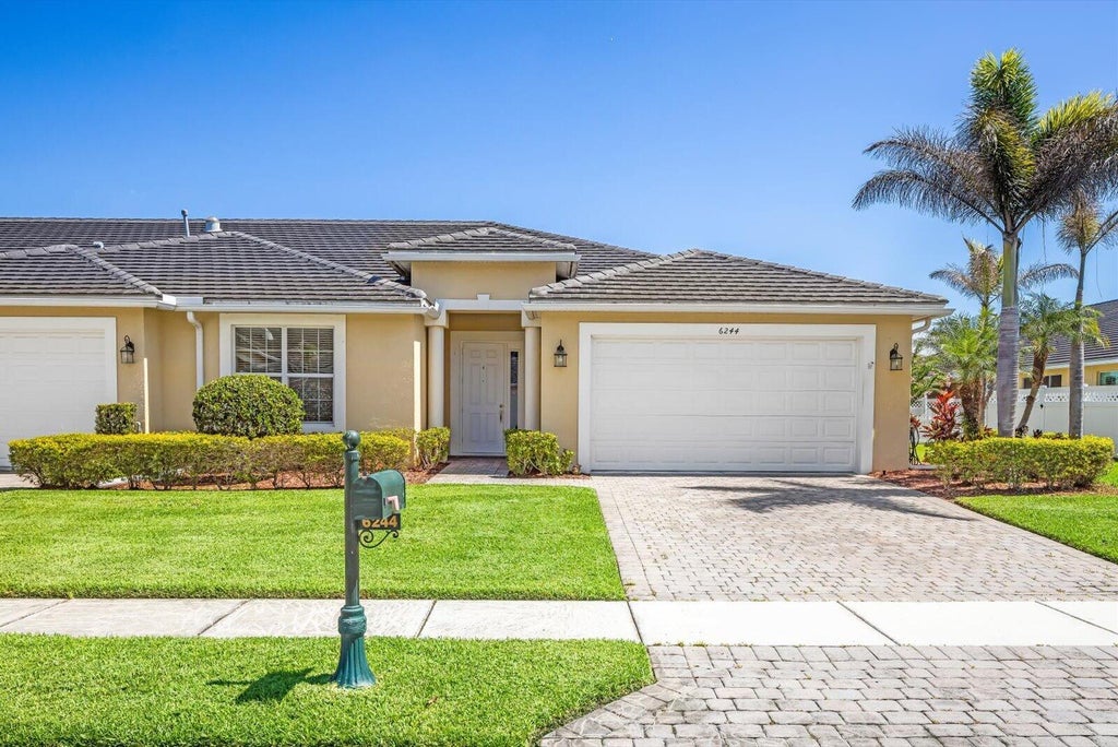Photo of 6244 NW Helmsdale Way, Port Saint Lucie, FL 34983 (MLS # B26045333)
