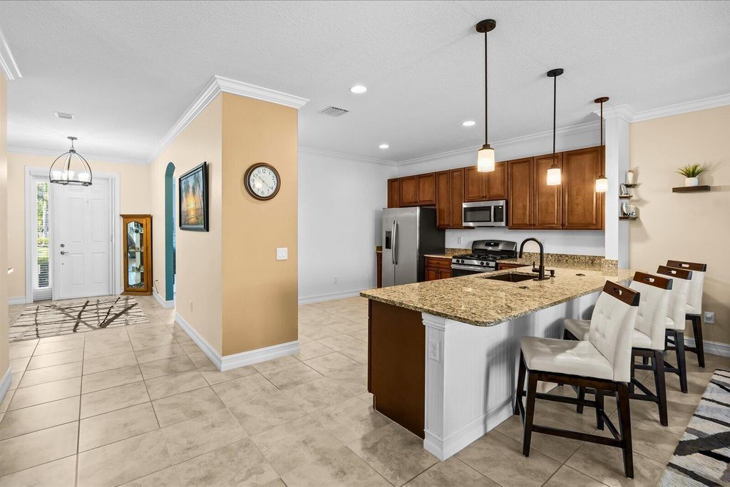 Photo of 6244 NW Helmsdale Way, Port Saint Lucie, FL 34983 (MLS # B26045333)