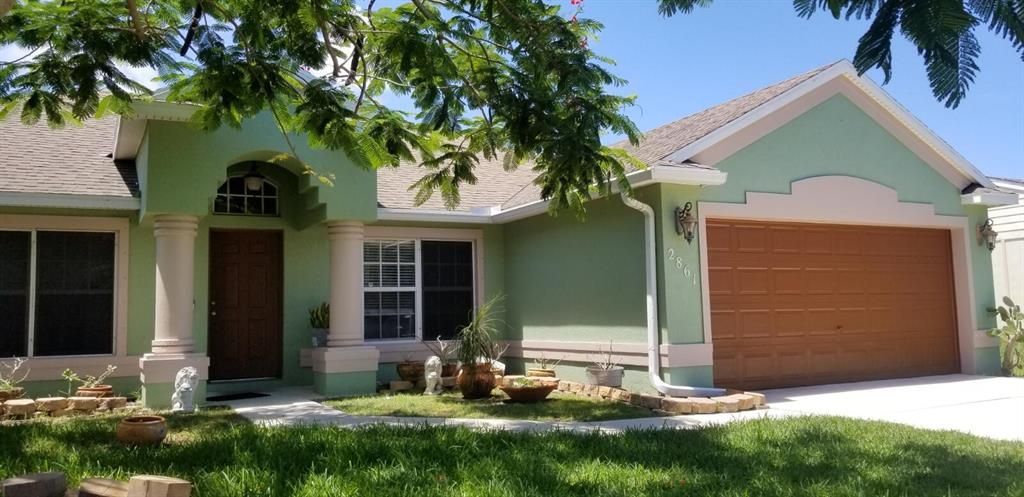 Photo of 2861 SE Ironton Avenue, Port Saint Lucie, FL 34952 (MLS # R10735825)