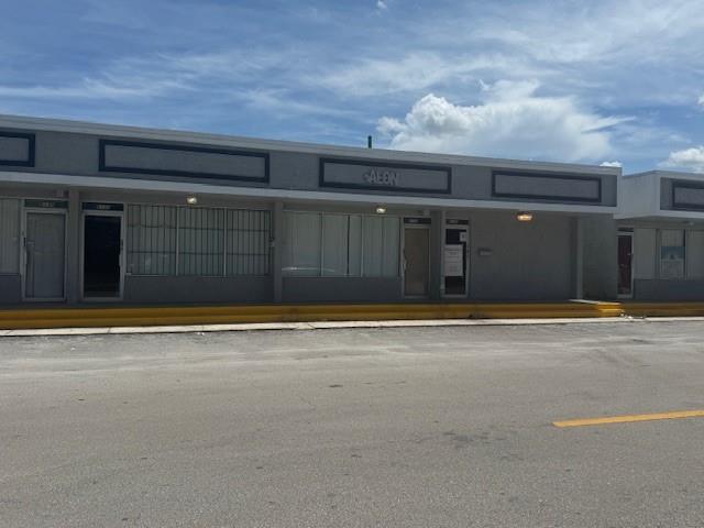 Unlock the potential of this commercial space in high- visibility and high- traffic area. (Three Units) This property offers adaptable space that can be ideal for offices, church, or mixed use development. Surrounded by different businesses, just minutes from major highways, this commercial property offers long-term growth potential.