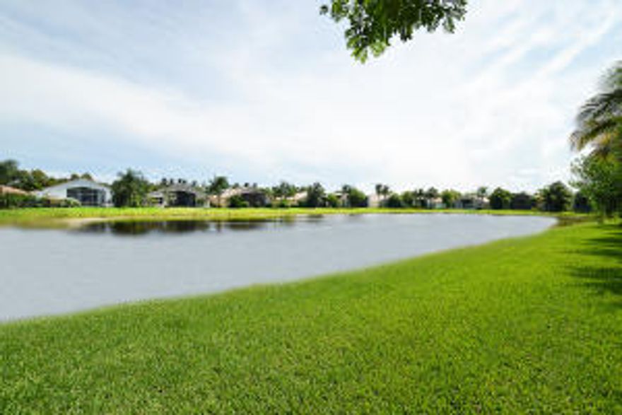 TRULY THE MOST MAGNIFICENT 4 BED 2.5 BA WITH BREATHTAKING VIEWS OF LAKE & GARDENS WITH WATERFALL.THIS HOME IS FOR THE MOST DISCRIMINATING BUYER. OVER $100,000 IN EXTRAS..FROM THE MOMENT YOU APPROACH THIS HOME YOU KNOW ITS SPECIAL.PLUSH LANDSCAPING,24'' MARBLE FLOORING,CROWN MOLDINGS,DESIGNER FIXTURES & DRAPERIES,FRENCH DOORS & CUSTOM CLOSETS THROUGHT, ACCORDIAN HURRICANE SHUTTERS.AWARD WINNING DREAM KITCHEN CHERRY WOOD CABINETS,GRANITE COUNTERS,S/S APPLIANCES,DOUBLE OVENS-A CHEFS DELIGHT!ELEGANTLY APPOINTED WRAP AROUND GRANITE BAR & WINE COOLER.LARGE MASTER SUITE,STATE OF THE ART MASTER BATH MARBLE COUNTERS,LEVEL 6 CABINETS.THIS HOME SPEAKS FOR ITSELF! A REAL SHOWPLACE! SEE & YOU''LL BUY!!!