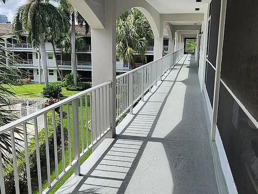 Well-maintained 2BR/2BA condo in Paradise Villas 55+ community of Hallandale Beach. This spacious 1,200 sq. ft. unit features an open floor plan with neutral tile flooring throughout and a full-sized screened porch offering serene pool and garden views. Enjoy resort-style living with a heated pool, shuffleboard, and a private waterfront park on the canal with BBQ areas and boat dock access. The building is elevator-secured and has completed its 50-year recertification. Incredible location just 1 mile to the beach and minutes from Gulfstream Park, Aventura Mall, and dining. Move-in ready and perfect for seasonal or year-round living. Assigned parking included. Experience the best of the South Florida lifestyle—schedule a tour today!