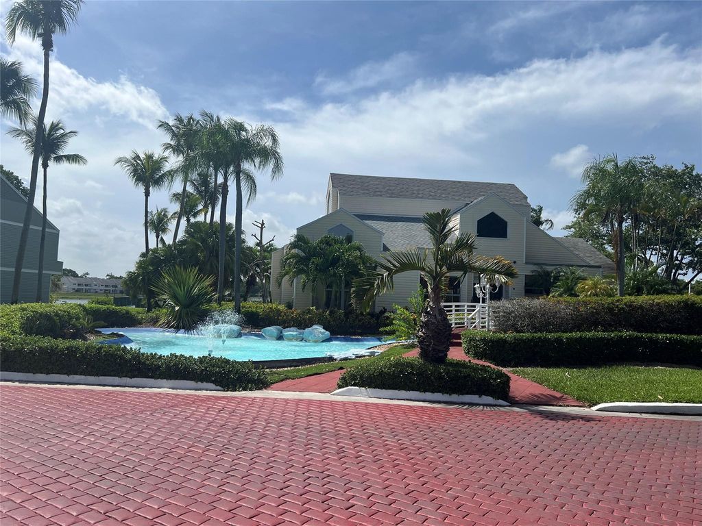 Photo of 3405 NW 44th Street #105, Lauderdale Lakes, FL 33309 (MLS # F10548053)