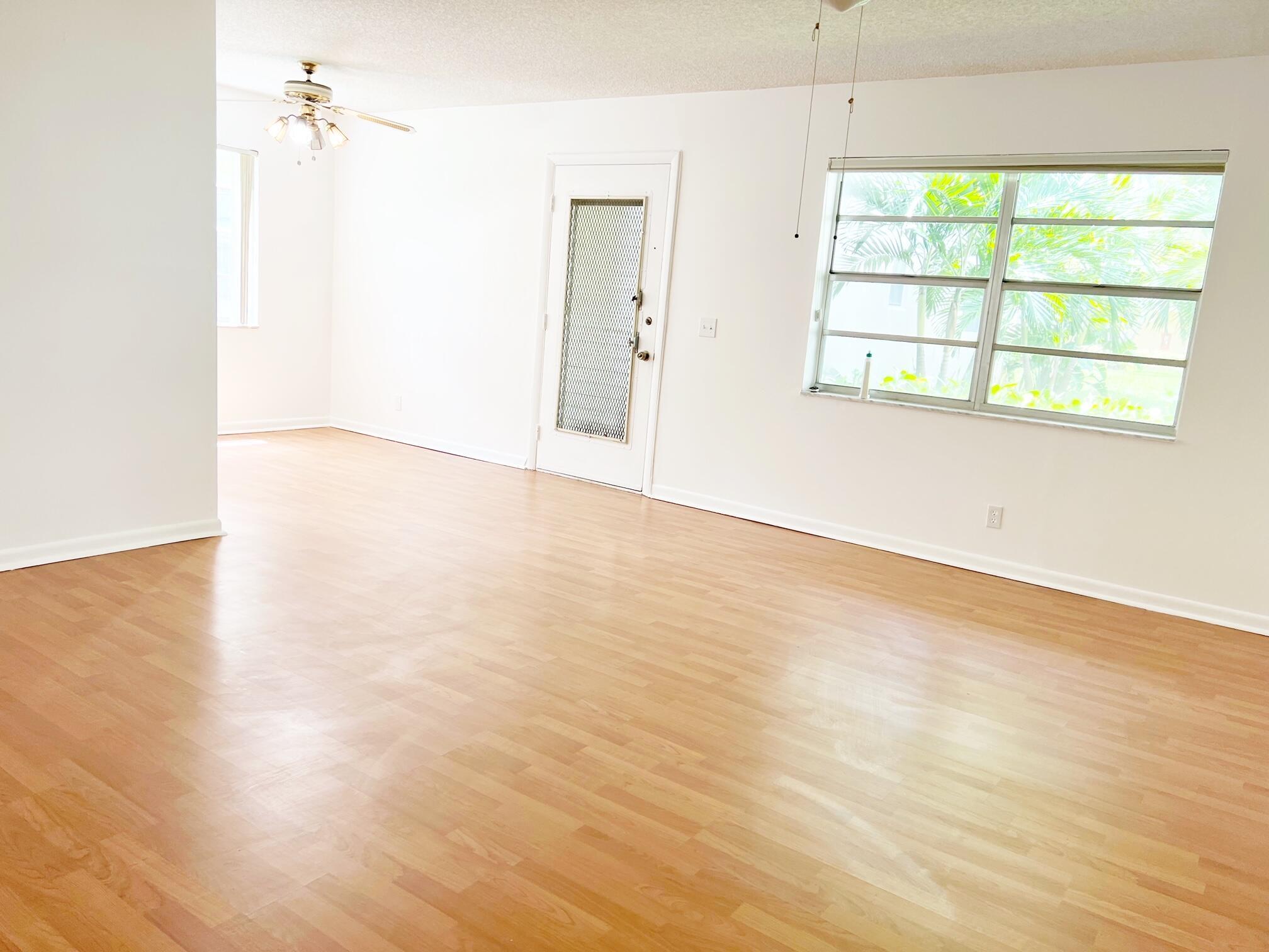 Spacious 2 bed, 2 bath corner unit on the 1st floor with plenty of natural light! This beautifully maintained unit features no carpet, a walk-in closet, an in-unit washer and dryer, and a screened patio. Located in a vibrant 55+ community, residents enjoy a resort-style lifestyle with phenomenal amenities, including Golf, Tennis, multiple community pools, a stunning clubhouse, theater, salon, restaurant, and a courtesy bus service.