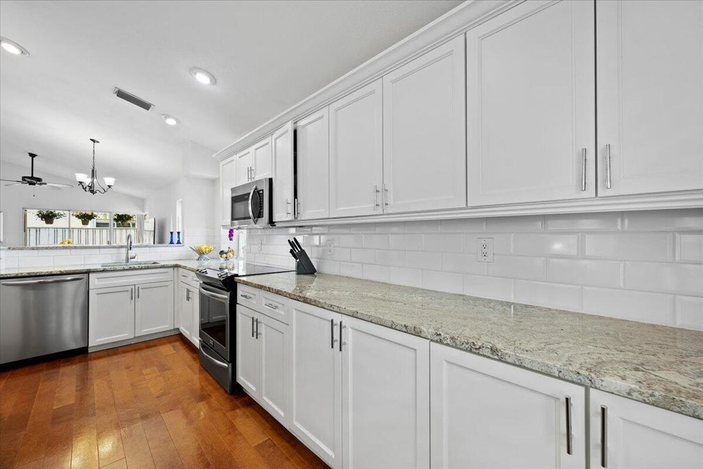 Photo of 28 Governors Court, Palm Beach Gardens, FL 33418 (MLS # R11080800)