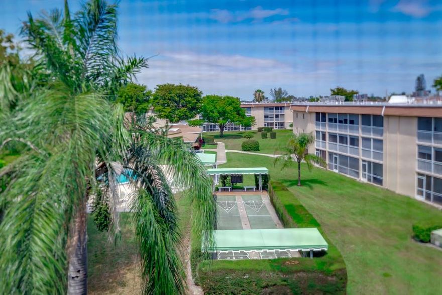 Fully Furnished move in ready beautiful 2 bedroom 1 -1/2 bath top floor unit in great location and great condition. Beautiful porcelain floors throughout, freshly painted with large balcony the length of both bedrooms with separate balcony entrance from each bedroom. Excellent views overlooking the Pool and bocce court and beautiful palm trees and garden. Unit has elevator and the parking space is right at front of building.  Great location near Military Trail, I-95, Florida Turnpike, restaurants, shopping centers and beaches. Wont Last. 55+ community, no Rentals first year.