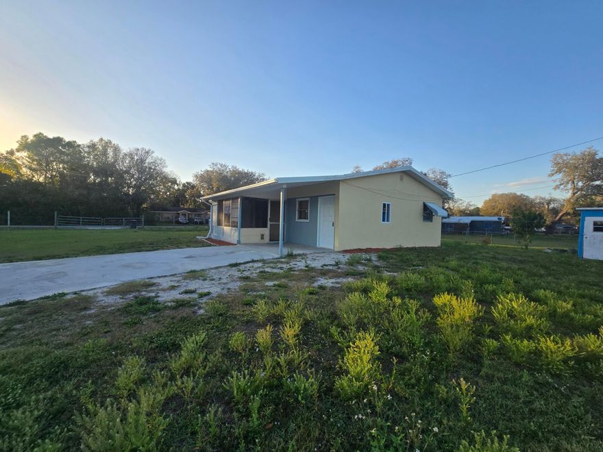 Basswood Estates~ Discover this spacious and budget-friendly opportunity in Okeechobee County! Perfect as a starter home or investment property, this 3-bedroom, 1-bath residence sits on a generous oversized corner lot. Enjoy convenient indoor laundry, durable ceramic tile flooring, and easy access to major U.S. highways for commuting in any direction. Ideally located just minutes from schools, parks, shopping, and everyday essentials. Situated on a .38-acre lot, this property offers plenty of space for future improvements and expansion. The home features a metal roof, is fully fenced and gated, and is connected to city water with a septic system. Best of all—no HOA, giving you the freedom to make it your own without extra fees. Schedule your private tour today!