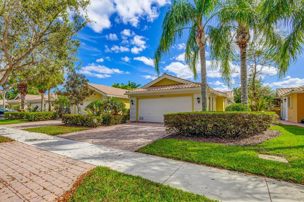 Photo of 5063 Magnolia Bay Circle, Palm Beach Gardens, FL 33418 (MLS # R10969415)