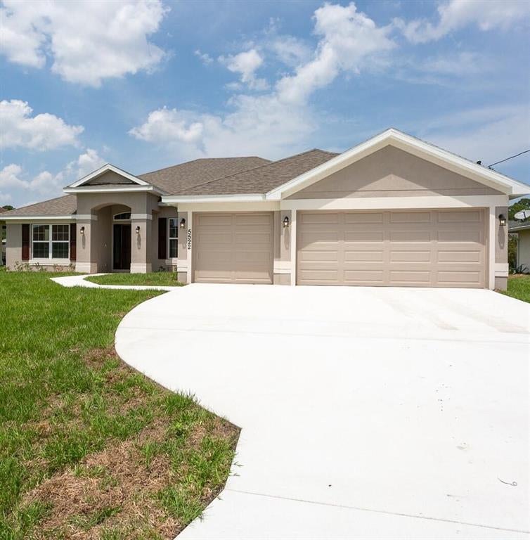 Photo of 5235 NW Iredell Street, Port Saint Lucie, FL 34986 (MLS # R10792732)