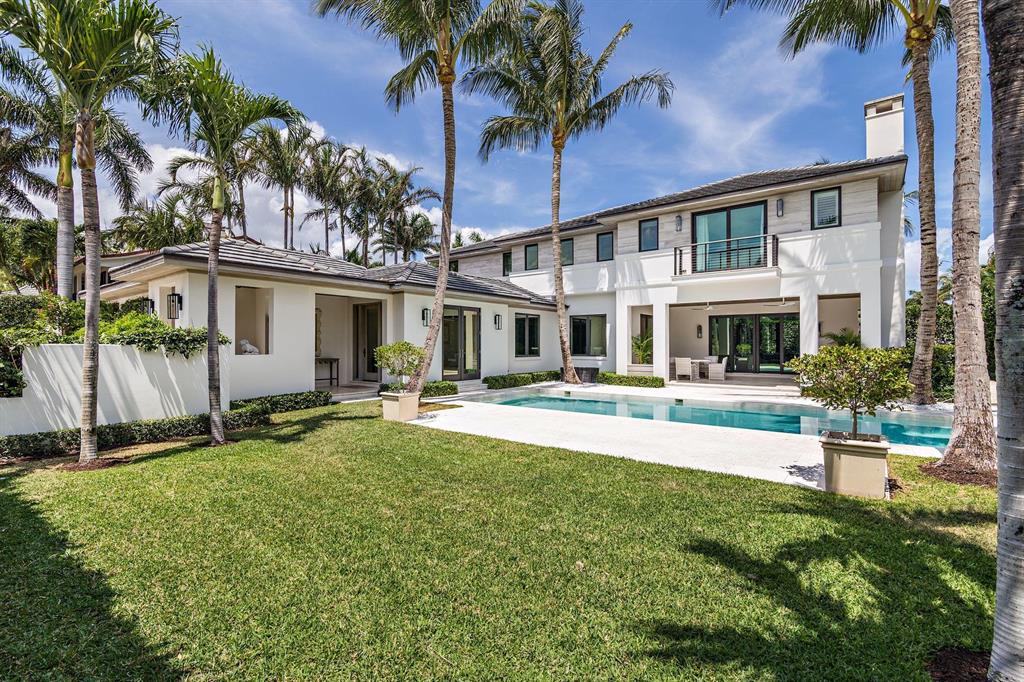 A very special contemporary house designed by Tom Kirchhoff, situated on one of the north end's most desirable streets. This house has soaring ceilings through out and an open floorplan for easy entertaining. There is a fantastic covered outdoor loggia overlooking the south facing pool. Gardens were designed by Marios Nievera. Amenities include, beach access, Savant lighting control system, home audio system, CAT5 wiring throughout, Kolby hurricane impact doors & windows, linear & flush AC vents, oil rubbed bronze hardware on doors and polished nickel fixtures in kitchen & baths. Sub-Zero refrig/freezer and refrigerated wine storage, Calacatta honed marble kitchen counters with Moroccan mosaic clay tile backsplash, LEEDS custom cabinetry throughout, Wolf 6-burner range with dual fuel ovens