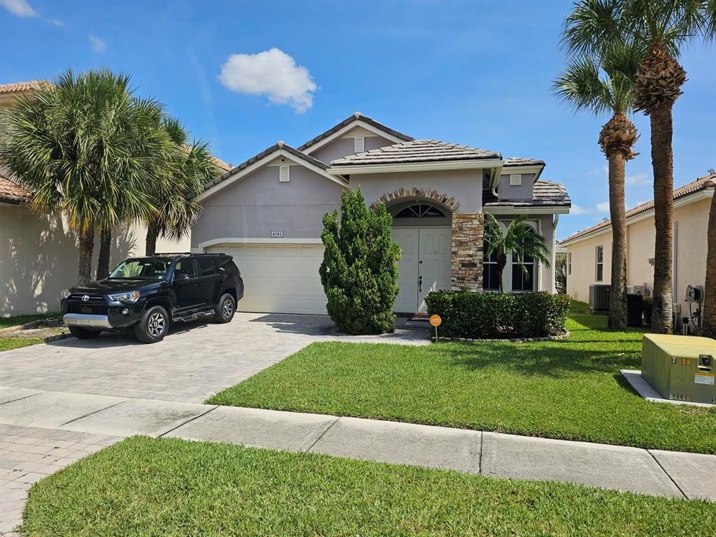 Photo of 4091 Plumbago Place, Lake Worth, FL 33462 (MLS # R10887563)