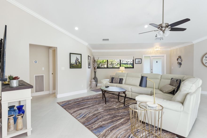 Beautifully upgraded 2BR/2BA beachside villa in Bella Vista, one of Jupiter's most desirable walk-to-the-beach communities. This fully furnished, turnkey residence offers a bright open layout with tasteful upgrades throughout. The primary suite features a king bed, while the guest bedroom includes two queen beds, perfect for family and guests. Enjoy a private fenced patio with BBQ, ideal for outdoor dining and enjoying Jupiter's ocean breezes. Just steps to Carlin Park, the Heart Trail, and lifeguard-patrolled beaches. Bella Vista amenities include pool, clubhouse, tennis, pickleball, bocce, and racquetball. Walk to restaurants, shopping, entertainment, Harbourside, the Par 3 Golf Course, and the Maltz Theatre. Enjoy the best of the Jupiter lifestyle! Secure your winter home today!